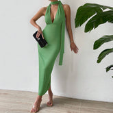 Robe de soirée slim dos nu avec sac à bandoulière